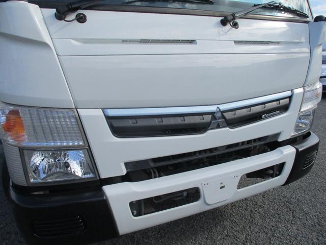 キャンター ２トン　ワイドロング　全低床　５速ＭＴ　床鉄板　ロープフック　荷寸４３４／１９０／３８　ロープ穴左右３箇所対　床フック左右３箇所対　左電格ミラー　取扱説明書　レベライザー　２トン平　２トンベース　２トン車　平　平車　ＷＬ　ワイド　ロング　架装（6枚目）