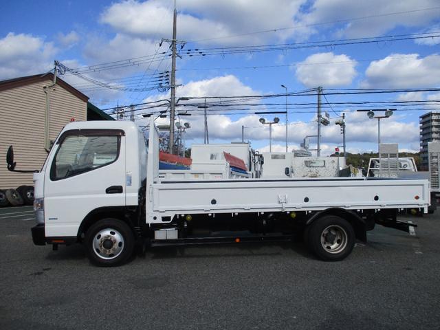 キャンター ２トン　ワイドロング　全低床　５速ＭＴ　床鉄板　ロープフック　荷寸４３４／１９０／３８　ロープ穴左右３箇所対　床フック左右３箇所対　左電格ミラー　取扱説明書　レベライザー　２トン平　２トンベース　２トン車　平　平車　ＷＬ　ワイド　ロング　架装（8枚目）