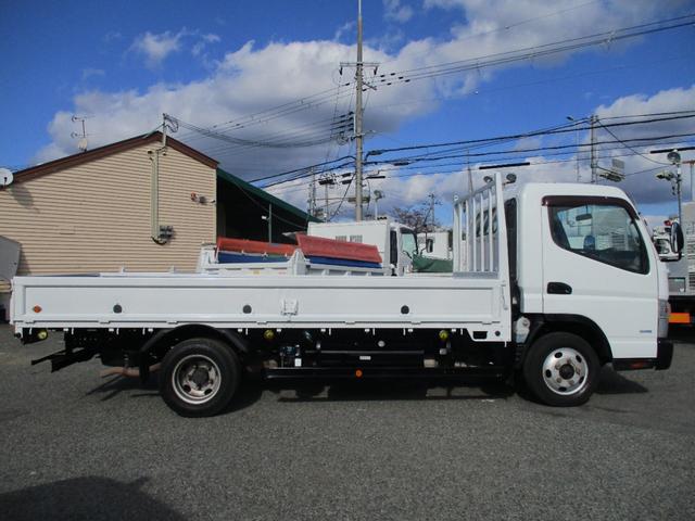 キャンター ２トン　ワイドロング　全低床　５速ＭＴ　床鉄板　ロープフック　荷寸４３４／１９０／３８　ロープ穴左右３箇所対　床フック左右３箇所対　左電格ミラー　取扱説明書　レベライザー　２トン平　２トンベース　２トン車　平　平車　ＷＬ　ワイド　ロング　架装（9枚目）