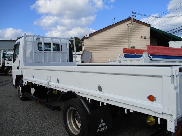 キャンター ２トン　ワイドロング　全低床　５速ＭＴ　床鉄板　ロープフック　荷寸４３４／１９０／３８　ロープ穴左右３箇所対　床フック左右３箇所対　左電格ミラー　取扱説明書　レベライザー　２トン平　２トンベース　２トン車　平　平車　ＷＬ　ワイド　ロング　架装（12枚目）