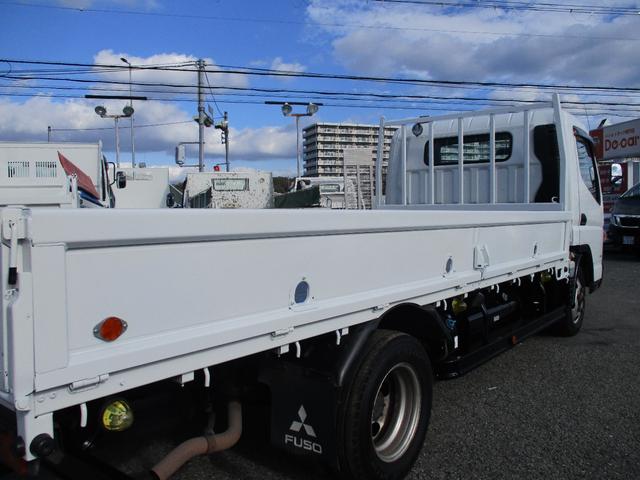 キャンター ２トン　ワイドロング　全低床　５速ＭＴ　床鉄板　ロープフック　荷寸４３４／１９０／３８　ロープ穴左右３箇所対　床フック左右３箇所対　左電格ミラー　取扱説明書　レベライザー　２トン平　２トンベース　２トン車　平　平車　ＷＬ　ワイド　ロング　架装（13枚目）