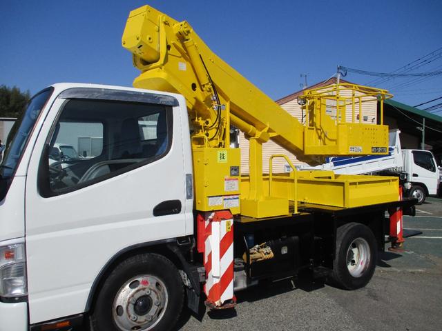 キャンター 作業床高１２ｍ　高所作業車　バケット２００ｋｇ　高床　５ＭＴ　積載１５０ｋｇ　作業半径９．８ｍ　アワーメーター４８８３．９ｈ　左電格ミラー　ＥＴＣ　荷台塗装　坂道発進補助装置　タダノ製　２トンベース　レベライザー　高所作業　トラック式　５速　５速ＭＴ　ＭＴ　架装（10枚目）