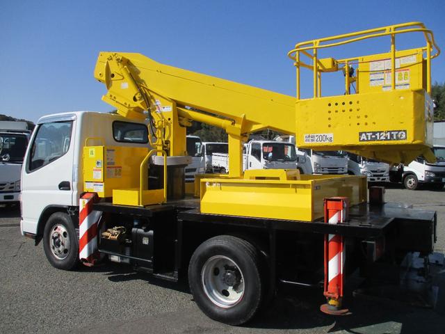 キャンター 作業床高１２ｍ　高所作業車　バケット２００ｋｇ　高床　５ＭＴ　積載１５０ｋｇ　作業半径９．８ｍ　アワーメーター４８８３．９ｈ　左電格ミラー　ＥＴＣ　荷台塗装　坂道発進補助装置　タダノ製　２トンベース　レベライザー　高所作業　トラック式　５速　５速ＭＴ　ＭＴ　架装（12枚目）