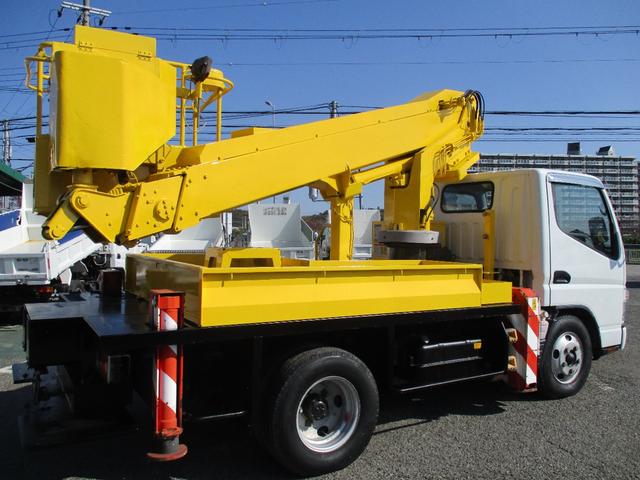 キャンター 作業床高１２ｍ　高所作業車　バケット２００ｋｇ　高床　５ＭＴ　積載１５０ｋｇ　作業半径９．８ｍ　アワーメーター４８８３．９ｈ　左電格ミラー　ＥＴＣ　荷台塗装　坂道発進補助装置　タダノ製　２トンベース　レベライザー　高所作業　トラック式　５速　５速ＭＴ　ＭＴ　架装（13枚目）
