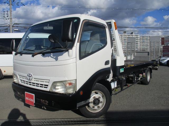 ダイナトラック ２トン　積載車　全低床　５ＭＴ　花見台製　ウインチ　リモコン　荷寸５５２／２０７　　レベライザー　路肩灯　両側オーバーヘッドコンソール　スペアタイヤ　取扱説明書　３トン　２トンベース　２トン車　ミッション　マニュアル　ＭＴ　車両運搬車（3枚目）