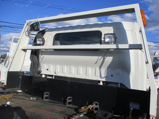 ダイナトラック ２トン　積載車　全低床　５ＭＴ　花見台製　ウインチ　リモコン　荷寸５５２／２０７　　レベライザー　路肩灯　両側オーバーヘッドコンソール　スペアタイヤ　取扱説明書　３トン　２トンベース　２トン車　ミッション　マニュアル　ＭＴ　車両運搬車（25枚目）