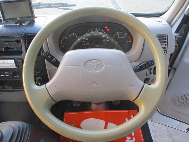 ダイナトラック ２トン　積載車　全低床　５ＭＴ　花見台製　ウインチ　リモコン　荷寸５５２／２０７　　レベライザー　路肩灯　両側オーバーヘッドコンソール　スペアタイヤ　取扱説明書　３トン　２トンベース　２トン車　ミッション　マニュアル　ＭＴ　車両運搬車（44枚目）