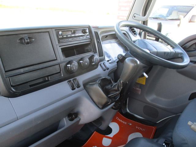 キャンター ３トン　強化ダンプ　全低床　５ＭＴ　コボレーン　ピン加工　あゆみ掛け　ロープフック　メッキパーツ　左電格ミラー　新明和ＤＲ２－１００１ＳＹ　　３トンダンプ　３トン車　２トンベース　ダンプ　新明和ダンプ　新明和　２トン　ダンプ（35枚目）