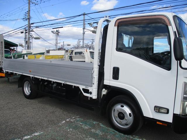 エルフトラック 2トン ワイドロング 全低床 6速MT アルミ縞板 ETC 荷寸430/207/38 アルミブロック 坂道発進補助装置 レベライザー バックカメラ 1ナンバー スペアタイヤ 2トンベース 2トン車 ミッション マニュアル MT 架装 平 平車(9枚目)