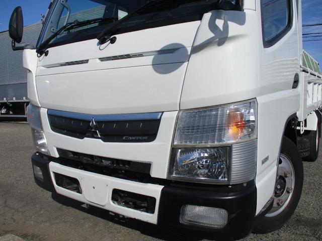 キャンター ３トン　強化ダンプ　全低床　５速ＭＴ　コボレーン　あゆみ掛け　荷寸３０４－１５９－３７　４ナンバー　１５０馬力　極東製　左電格ミラー　枕木　ＡＢＳ　車線逸脱警報装置　２トン車　オーバーヘッドコンソール　地上高８６ｃｍ　コボレーンシート　盗難防止システム　小型（2枚目）