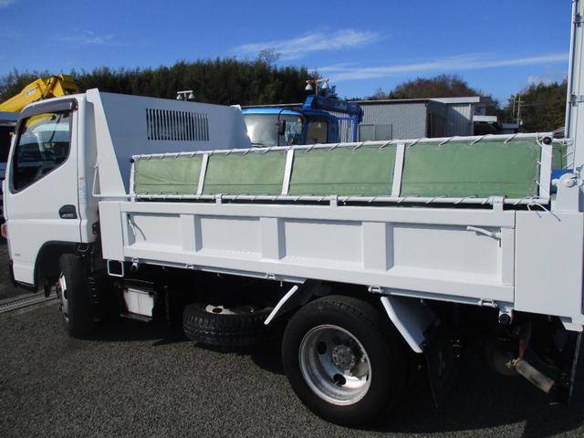 キャンター ３トン　強化ダンプ　全低床　５速ＭＴ　コボレーン　あゆみ掛け　荷寸３０４－１５９－３７　４ナンバー　１５０馬力　極東製　左電格ミラー　枕木　ＡＢＳ　車線逸脱警報装置　２トン車　オーバーヘッドコンソール　地上高８６ｃｍ　コボレーンシート　盗難防止システム　小型（13枚目）