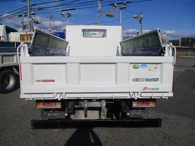 キャンター ３トン　強化ダンプ　全低床　５速ＭＴ　コボレーン　あゆみ掛け　荷寸３０４－１５９－３７　４ナンバー　１５０馬力　極東製　左電格ミラー　枕木　ＡＢＳ　車線逸脱警報装置　２トン車　オーバーヘッドコンソール　地上高８６ｃｍ　コボレーンシート　盗難防止システム　小型（16枚目）