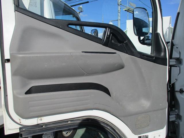 キャンター ３トン　強化ダンプ　全低床　５速ＭＴ　コボレーン　あゆみ掛け　荷寸３０４－１５９－３７　４ナンバー　１５０馬力　極東製　左電格ミラー　枕木　ＡＢＳ　車線逸脱警報装置　２トン車　オーバーヘッドコンソール　地上高８６ｃｍ　コボレーンシート　盗難防止システム　小型（30枚目）