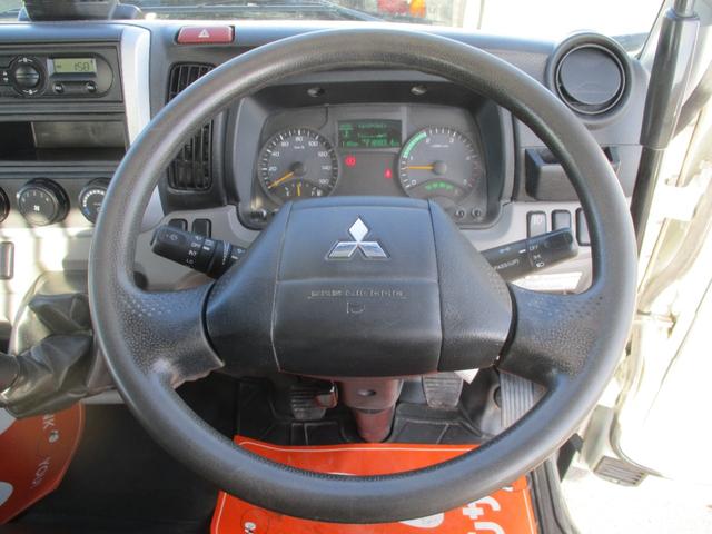 キャンター ３トン　強化ダンプ　全低床　５速ＭＴ　コボレーン　あゆみ掛け　荷寸３０４－１５９－３７　４ナンバー　１５０馬力　極東製　左電格ミラー　枕木　ＡＢＳ　車線逸脱警報装置　２トン車　オーバーヘッドコンソール　地上高８６ｃｍ　コボレーンシート　盗難防止システム　小型（32枚目）