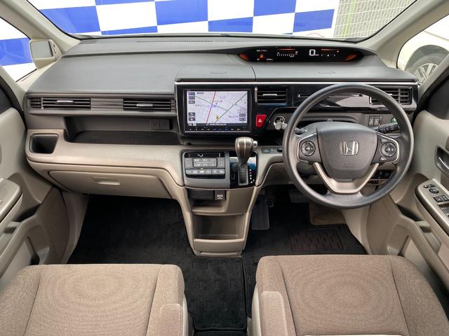 ステップワゴン G ホンダセンシング 衝突軽減/9型ナビ/フルセグ/Bカメラ/両側パワスラ/後席モニタ/Bluetoothオーディオ/舵角支援レーダークルーズコントロール/スマートキー/プッシュスタート(3枚目)