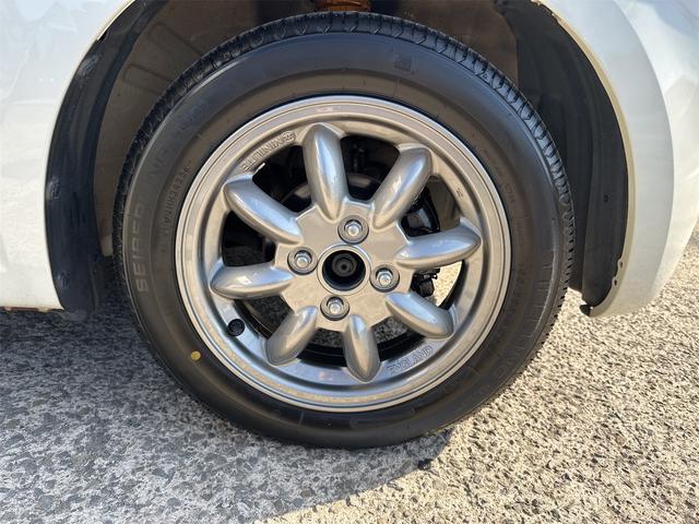 アルトラパン X ローダウン 車高調 リアアジャストラテラルロッド ミニライトホイール 社外エアークリーナー 10thアニバーサリーグリル フルセグナビ ウッドステアリング スマートキー 電動格納式ウインカーミラー(8枚目)