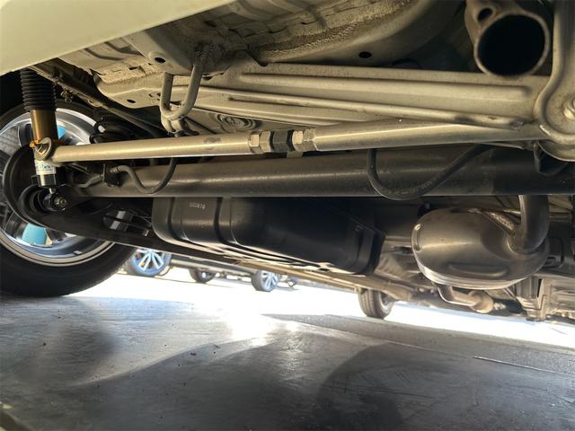 アルトラパン X ローダウン 車高調 リアアジャストラテラルロッド ミニライトホイール 社外エアークリーナー 10thアニバーサリーグリル フルセグナビ ウッドステアリング スマートキー 電動格納式ウインカーミラー(11枚目)