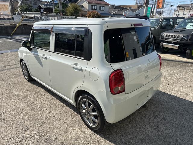 アルトラパン X ローダウン 車高調 リアアジャストラテラルロッド ミニライトホイール 社外エアークリーナー 10thアニバーサリーグリル フルセグナビ ウッドステアリング スマートキー 電動格納式ウインカーミラー(20枚目)