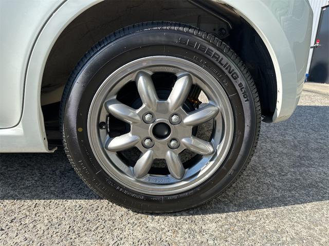 アルトラパン X ローダウン 車高調 リアアジャストラテラルロッド ミニライトホイール 社外エアークリーナー 10thアニバーサリーグリル フルセグナビ ウッドステアリング スマートキー 電動格納式ウインカーミラー(36枚目)