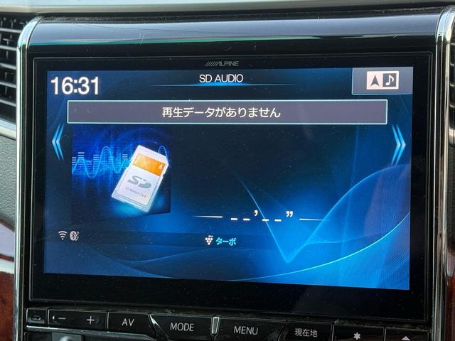 ヴェルファイア ２．４Ｚ　プラチナセレクションＩＩ　両側パワースライドドア　電動リアゲート　ツインサンルーフ　アルパイン１０インチナビ　アルパイン１１．５インチフリップダウンモニター　バックカメラ　オットマンシート　純正１８インチＡＷ　ＨＩＤライト（25枚目）