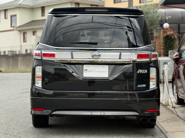 エルグランド ２５０ハイウェイスター　両側パワースライドドア　サンルーフ　アラウンドビューモニター　純正ナビ　純正フリップダウンモニター　オットマンシート　ニスモツインマフラー　トップラン１７インチＡＷ　ブリヂストンスタッドレスタイヤ（7枚目）