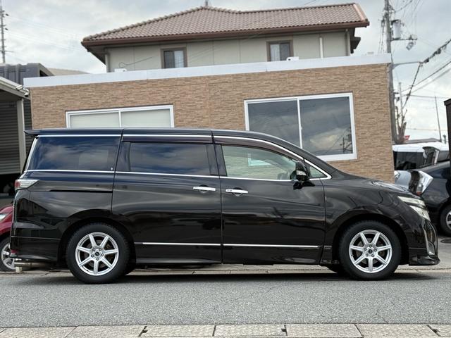 エルグランド ２５０ハイウェイスター　両側パワースライドドア　サンルーフ　アラウンドビューモニター　純正ナビ　純正フリップダウンモニター　オットマンシート　ニスモツインマフラー　トップラン１７インチＡＷ　ブリヂストンスタッドレスタイヤ（9枚目）