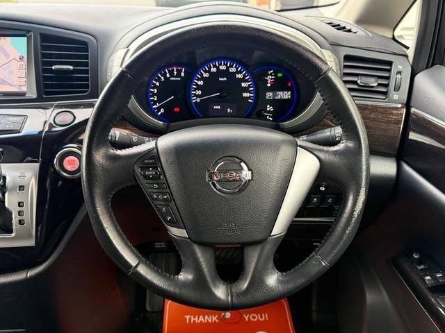 エルグランド ２５０ハイウェイスター　両側パワースライドドア　サンルーフ　アラウンドビューモニター　純正ナビ　純正フリップダウンモニター　オットマンシート　ニスモツインマフラー　トップラン１７インチＡＷ　ブリヂストンスタッドレスタイヤ（10枚目）