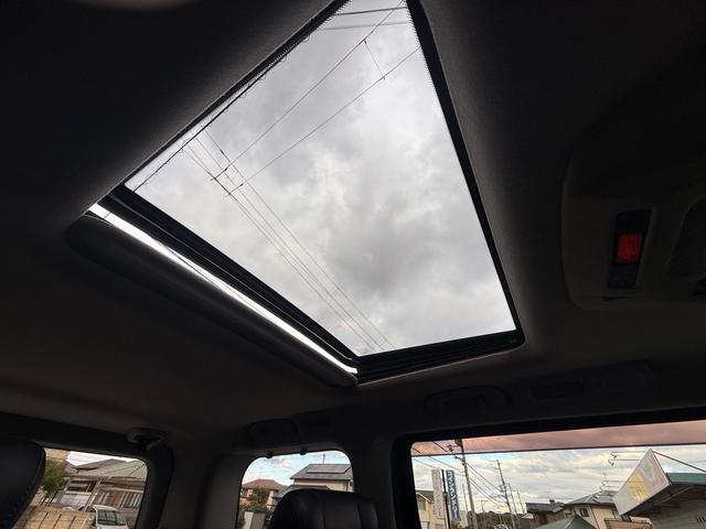 エルグランド ２５０ハイウェイスター　両側パワースライドドア　サンルーフ　アラウンドビューモニター　純正ナビ　純正フリップダウンモニター　オットマンシート　ニスモツインマフラー　トップラン１７インチＡＷ　ブリヂストンスタッドレスタイヤ（48枚目）