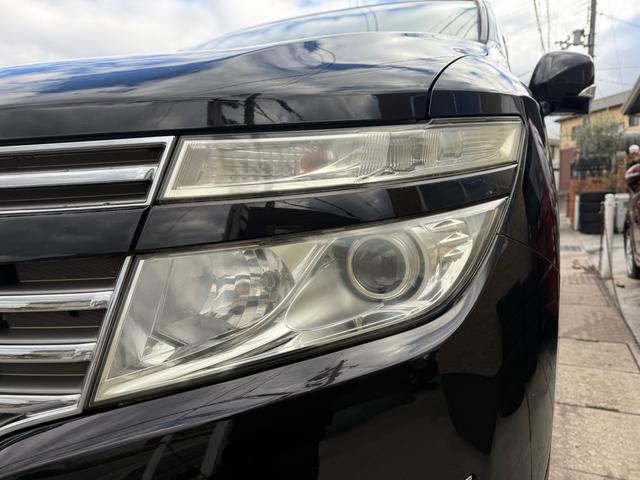 エルグランド ２５０ハイウェイスター　両側パワースライドドア　サンルーフ　アラウンドビューモニター　純正ナビ　純正フリップダウンモニター　オットマンシート　ニスモツインマフラー　トップラン１７インチＡＷ　ブリヂストンスタッドレスタイヤ（64枚目）