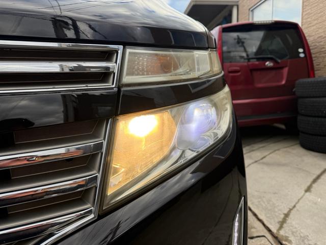 エルグランド ２５０ハイウェイスター　両側パワースライドドア　サンルーフ　アラウンドビューモニター　純正ナビ　純正フリップダウンモニター　オットマンシート　ニスモツインマフラー　トップラン１７インチＡＷ　ブリヂストンスタッドレスタイヤ（66枚目）