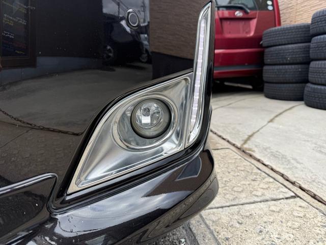 エルグランド ２５０ハイウェイスター　両側パワースライドドア　サンルーフ　アラウンドビューモニター　純正ナビ　純正フリップダウンモニター　オットマンシート　ニスモツインマフラー　トップラン１７インチＡＷ　ブリヂストンスタッドレスタイヤ（68枚目）