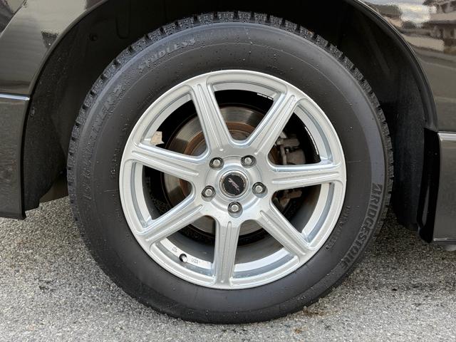 エルグランド ２５０ハイウェイスター　両側パワースライドドア　サンルーフ　アラウンドビューモニター　純正ナビ　純正フリップダウンモニター　オットマンシート　ニスモツインマフラー　トップラン１７インチＡＷ　ブリヂストンスタッドレスタイヤ（74枚目）