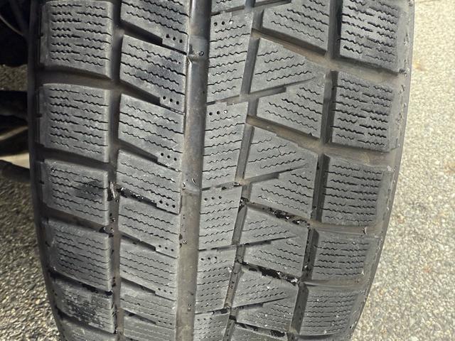 エルグランド ２５０ハイウェイスター　両側パワースライドドア　サンルーフ　アラウンドビューモニター　純正ナビ　純正フリップダウンモニター　オットマンシート　ニスモツインマフラー　トップラン１７インチＡＷ　ブリヂストンスタッドレスタイヤ（78枚目）