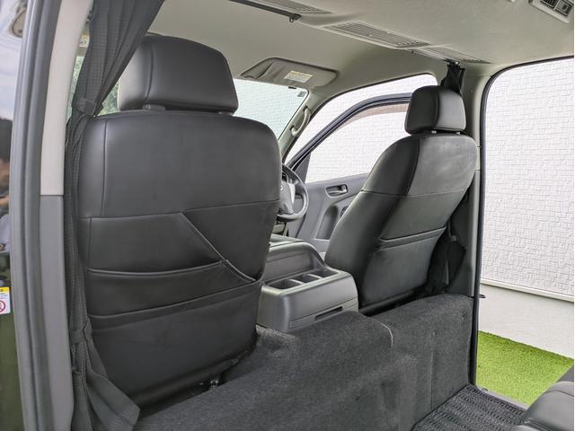 ＮＶ３５０キャラバンバン ロングライダープレミアムＧＸ　ベッドキット／５ＺＩＧＥＮ　ＫＯＭＡ　１５インチ／リアクーラー／リアヒーター／Ｐａｎａｓｏｎｉｃ製ナビ／フルセグＴＶ／Ｂｌｕｅｔｏｏｔｈ／ＥＴＣ／両側スライドドア／ハーフレザーシート／インテリキー（62枚目）