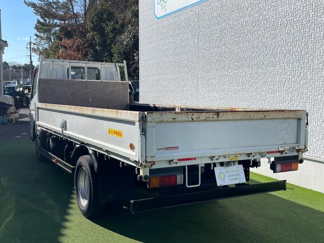 キャンター ロング全低床ＤＸ　標準キャブ／ロング／全低床／荷台床板張り／アオリ開閉補助装置／車線逸脱警報装置／３ペダルＭＴ／ディーゼル／積載量２ｔ／車両総重量４７２５キロ／準中型免許運転可／エンジン型式４Ｐ１０（12枚目）