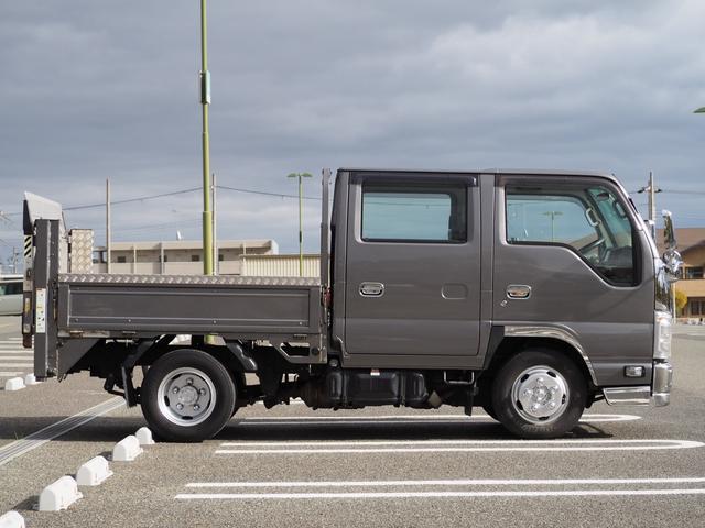 Ｗキャブ　新明和垂直ゲート　昇降荷重８００ｋｇ　積載１９５０ｋｇ　荷台内寸２０１×１６０×３８ｃｍ　ゲート１６０×１０３ｃｍ　新品メッキパーツ／シートカバー　荷台縞板加工　ナビ　ＥＴＣ　ＢＴ　後輪Ｗタイヤ　電格(9枚目)