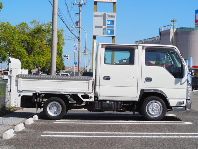 エルフトラック Ｗキャブフラットロー　極東パワーゲート　昇降荷重６００ｋｇ（１５７ｃｍ×８７ｃｍ）　最積１４５０ｋｇ　荷台内寸２０３ｃｍ×１６１ｃｍ×３８ｃｍ　後輪Ｗタイヤ　シートカバー　メッキパーツ　荷台／アオリ縞板　ＥＴＣ　キーレス（10枚目）