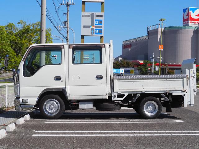 エルフトラック Ｗキャブフラットロー　極東パワーゲート　昇降荷重６００ｋｇ（１５７ｃｍ×８７ｃｍ）　最積１４５０ｋｇ　荷台内寸２０３ｃｍ×１６１ｃｍ×３８ｃｍ　後輪Ｗタイヤ　シートカバー　メッキパーツ　荷台／アオリ縞板　ＥＴＣ　キーレス（13枚目）