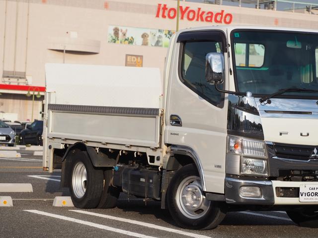 キャンター 平ボディ　パワーゲート付き　極東パワーゲート　昇降荷重６００ｋｇ（９４ｃｍ×１５８ｃｍ）　最積１５００ｋｇ　荷台内寸１６０ｃｍ×３０８ｃｍ×３８ｃｍ　後輪Ｗタイヤ　メッキパーツ　アオリ縞板　ナビ　地デジ　ＤＶＤ／ＣＤ／ＢＴ（5枚目）