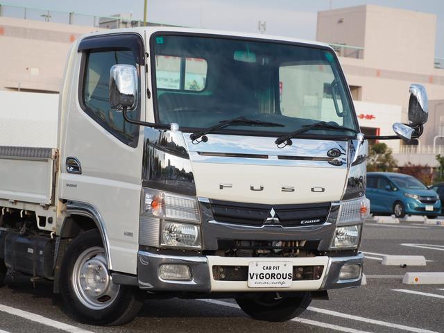 キャンター 平ボディ　パワーゲート付き　極東パワーゲート　昇降荷重６００ｋｇ（９４ｃｍ×１５８ｃｍ）　最積１５００ｋｇ　荷台内寸１６０ｃｍ×３０８ｃｍ×３８ｃｍ　後輪Ｗタイヤ　メッキパーツ　アオリ縞板　ナビ　地デジ　ＤＶＤ／ＣＤ／ＢＴ（9枚目）