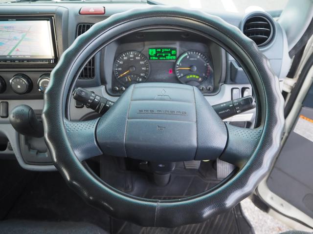 キャンター 平ボディ　パワーゲート付き　極東パワーゲート　昇降荷重６００ｋｇ（９４ｃｍ×１５８ｃｍ）　最積１５００ｋｇ　荷台内寸１６０ｃｍ×３０８ｃｍ×３８ｃｍ　後輪Ｗタイヤ　メッキパーツ　アオリ縞板　ナビ　地デジ　ＤＶＤ／ＣＤ／ＢＴ（23枚目）