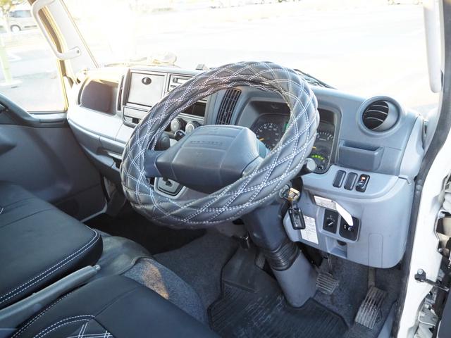 キャンター Ｗキャブ全低床　新明和垂直パワーゲート　昇降荷重６００ｋｇ（１００ｃｍ×１５８ｃｍ）　最積２０００ｋｇ　荷台内寸（２０７ｃｍ×１６１ｃｍ×３７ｃｍ）　後輪Ｗタイヤ　ＥＴＣ　シートカバー／ハンドルカバー　メッキパーツ（21枚目）