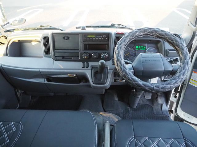 キャンター Ｗキャブ全低床　新明和垂直パワーゲート　昇降荷重６００ｋｇ（１００ｃｍ×１５８ｃｍ）　最積２０００ｋｇ　荷台内寸（２０７ｃｍ×１６１ｃｍ×３７ｃｍ）　後輪Ｗタイヤ　ＥＴＣ　シートカバー／ハンドルカバー　メッキパーツ（22枚目）