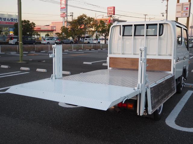 キャンター Ｗキャブ全低床　新明和垂直パワーゲート　昇降荷重６００ｋｇ（１００ｃｍ×１５８ｃｍ）　最積２０００ｋｇ　荷台内寸（２０７ｃｍ×１６１ｃｍ×３７ｃｍ）　後輪Ｗタイヤ　ＥＴＣ　シートカバー／ハンドルカバー　メッキパーツ（65枚目）