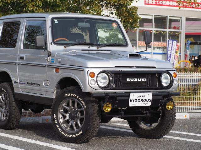 ジムニー ランドベンチャー リフトアップ 16AW TOYOR/Tタイヤ 社外前後バンパー/マフラー/グリル NARDIステアリング RAYBRIGライト フォグ DVD/CD/USB バックカメラ シートカバー LEDライト(9枚目)