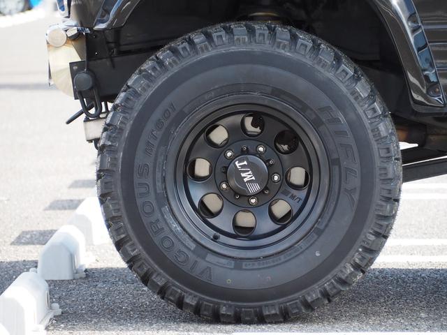 ジムニー ワイルドウインド　リフトアップ　ミッキートンプソン１５ＡＷ　オーバーフェンダー　Ｆ／Ｒパイプバンパー　ディスプレイオーディオ　ＤＶＤ／ＣＤ／ＢＴ　社外ステアリング／グリル　シートカバー　ＬＥＤライト（14枚目）