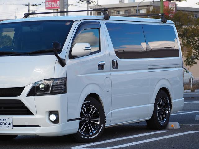 レジアスエースバン スーパーＧＬ　ダークプライム　ローダウン　１６ＡＷ　ジオランダーＡ／Ｔタイヤ　社外ボンネット／グリル　エアロ　ルーフレール　ナビ　地デジ　ＤＶＤ／ＣＤ／ＢＴ　バックカメラ　ドラレコ　ＥＴＣ　ＬＥＤライト／テール／フォグ　半革シート（6枚目）