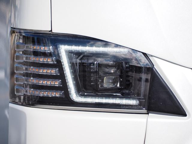 レジアスエースバン スーパーＧＬ　ダークプライム　ローダウン　１６ＡＷ　ジオランダーＡ／Ｔタイヤ　社外ボンネット／グリル　エアロ　ルーフレール　ナビ　地デジ　ＤＶＤ／ＣＤ／ＢＴ　バックカメラ　ドラレコ　ＥＴＣ　ＬＥＤライト／テール／フォグ　半革シート（7枚目）