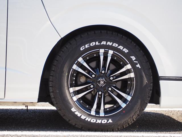 レジアスエースバン スーパーＧＬ　ダークプライム　ローダウン　１６ＡＷ　ジオランダーＡ／Ｔタイヤ　社外ボンネット／グリル　エアロ　ルーフレール　ナビ　地デジ　ＤＶＤ／ＣＤ／ＢＴ　バックカメラ　ドラレコ　ＥＴＣ　ＬＥＤライト／テール／フォグ　半革シート（12枚目）