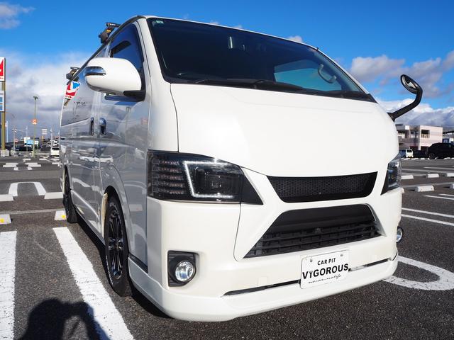 レジアスエースバン スーパーＧＬ　ダークプライム　ローダウン　１６ＡＷ　ジオランダーＡ／Ｔタイヤ　社外ボンネット／グリル　エアロ　ルーフレール　ナビ　地デジ　ＤＶＤ／ＣＤ／ＢＴ　バックカメラ　ドラレコ　ＥＴＣ　ＬＥＤライト／テール／フォグ　半革シート（65枚目）